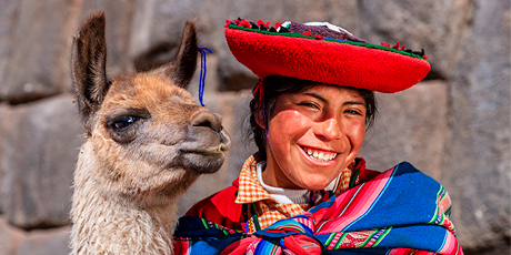 Peruvian girl with an alpaca